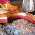 Omega Custom- purpleheart core with bubinga and ebony palm swell